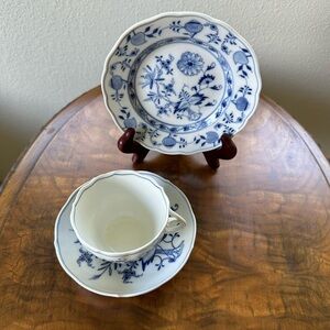 Meissen Pottery Cup and saucers and small plate.